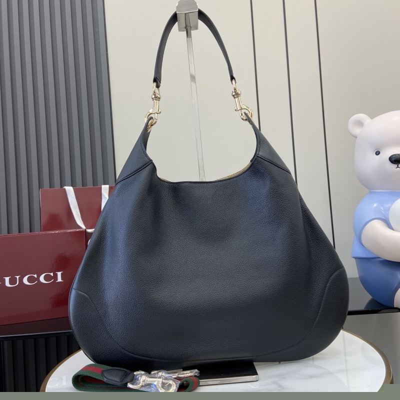G*u*i top handle bags